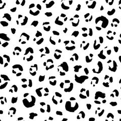 Fototapeta na wymiar Seamless animal pattern with leopard dots. Creative monochrome texture for fabric, wrapping. Vector illustration