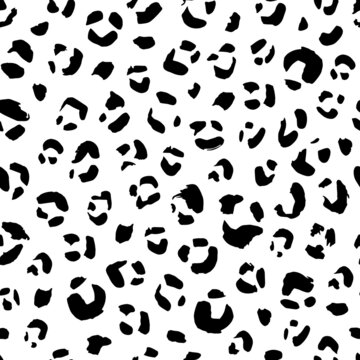 Seamless animal pattern with leopard dots. Creative monochrome texture for fabric, wrapping. Vector illustration