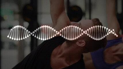 Animation of dna strand over muscular man exercising - Powered by Adobe