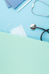Stethoscope with notepad on the nurse desk.