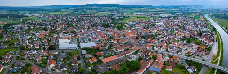 Fototapeta na wymiar Aerial view around the city Hirschaid in Germany, on a sunny day in spring.