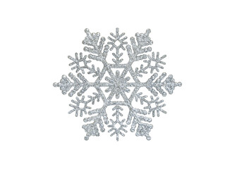 silver snowflake toy with sparkles isolated on white background