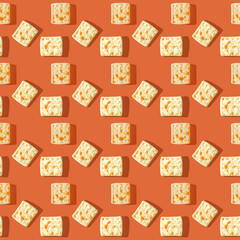 Photo in the form of a seamless pattern. Yellow-brown biscuits with shadows on a colored orange background. High quality photo