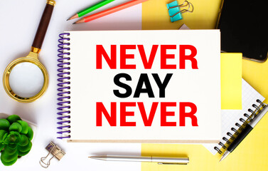 businesswoman holding a card with text NEVER SAY NEVER.