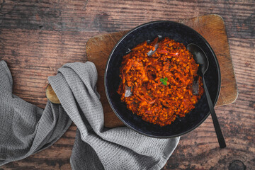 vegan vegan eggplant lentil curry with tomato sauce and cilantro, healthy plant-based food