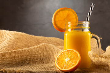Glass with orange juice on the table. © WS Studio