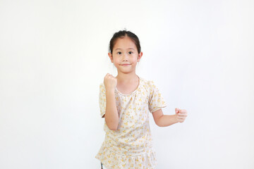 Smiling Asian little girl child showing expression hand holding something without theme isolated on white background