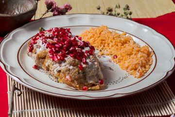 rich and traditional chiles en nogada typical of Mexico