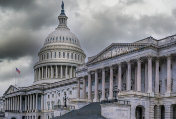Dark storm clouds over the US Capitol building in Washington DC