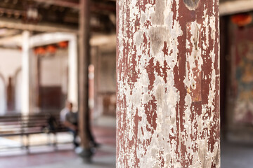 aged wooden pillar with crack paint