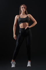 Fototapeta na wymiar fitness lady in black sportswear