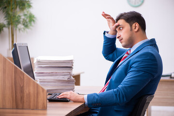 Young businessman employee working in the office