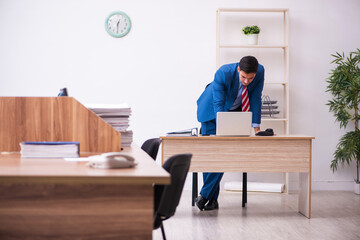 Young businessman employee working in the office