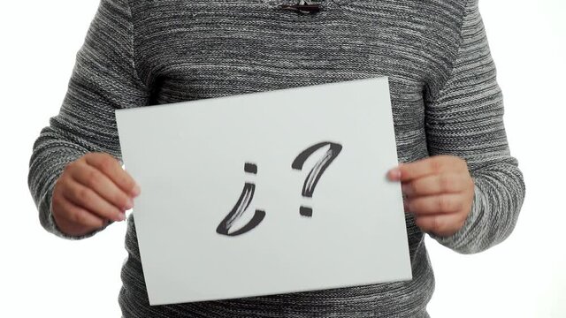 A person holding a sign with the signs &iquest;? 4k