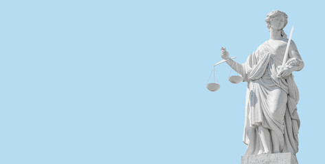Banner with statue a judge woman with scales and sword at blue sky solid background in Potsdam,...