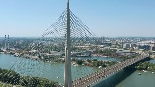 Aerial: iconic Ada Bridge in Belgrade Serbia, cable bridge over Sava river