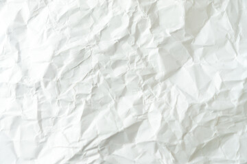 Top view of white crumpled paper texture.