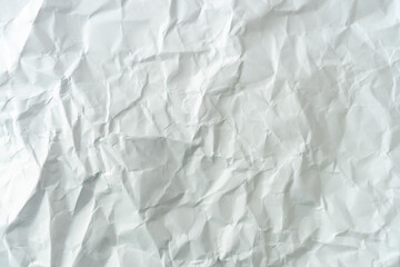 Top view of white crumpled paper texture.