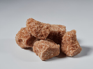 brown sugar cubes isolated on a white background