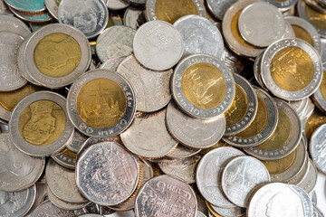 Many of Thai Baht Coins background. Selective focus.