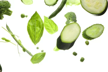 Zelfklevend Fotobehang Flying green vegetables on white background © Pixel-Shot