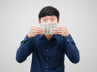 Man cheeful close his face by money dollar lookign at camera white background