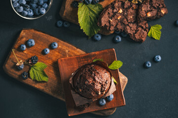 Chocolate muffin. Muffin with chocolate and fruits. Fruit muffin.