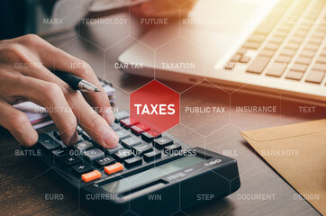 business man calculating past taxes with icons showing as a table on the tax deductible screen It...