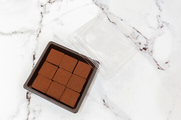 Home made fresh Nama Chocolate, Modern Japanese desserts covered with cacao powder.