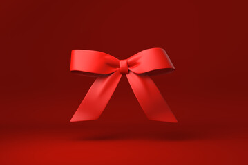 Red Bow in red background. minimal concept idea creative. monochrome. 3D render.