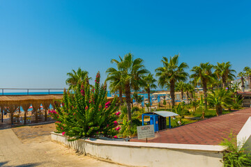 Fototapeta na wymiar ANTALYA, TURKEY: Beautiful landscape on the beach on the Mediterranean coast in Antalya.