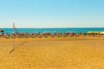 ANTALYA, TURKEY: Sun loungers and umbrellas on the Lara beach on a sunny summer day in Antalya.