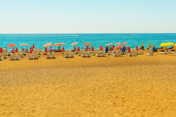 ANTALYA, TURKEY: Sun loungers and umbrellas on the Lara beach on a sunny summer day in Antalya.