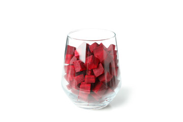 Glass with beetroot cubes isolated on white background