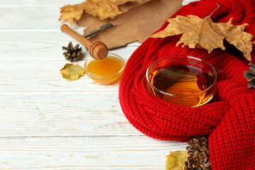 Cozy autumn concept background with tea drink