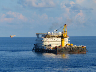Fototapeta premium A typical Offshore Accommodation and Work Barge in the Oil and Gas industry. Offshore Accommodation Barge to serve as an offshore hotel to personnel and crew.