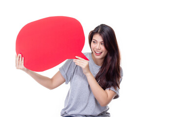 Attractive beautiful young asian woman smile and excited holding empty speech bubble isolated on white background.
