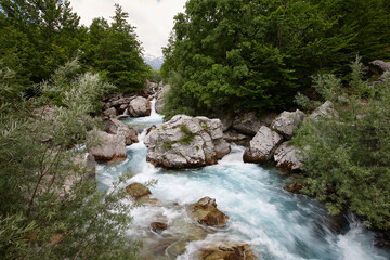 Blue waters of mountain river in Valbone valley