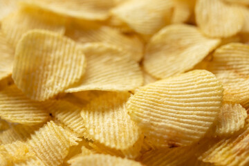 crispy golden potato chips snack texture background