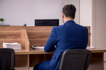 Young businessman employee working in the office