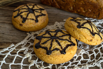 Homemade cookies with spiderweb for Halloween celebration