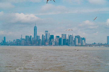 New York City skyline far away and clouds in the sky