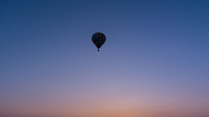 color hot air balloon in sky cloud and sunrise background at the morning time 
