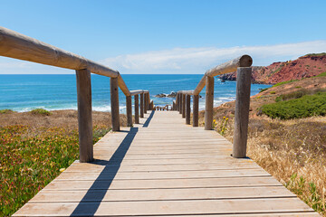 way down to Amado Beach, wooden boardwalk and sea view, west algarve portugal