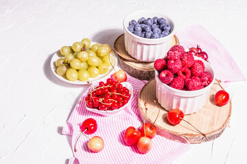Fresh raspberries, blueberries, grape, sweet cherries, and red currants