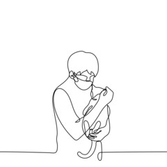 veterinarian in a mask holds a cat in his arms - one line drawing. the concept of treating cats, going to the veterinary clinic, volunteer at the cat shelter