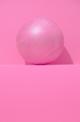 Minimal ball on pink trendy shadows space. Fashion still life art. Geometric and details concept