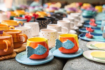 handmade ceramic coffee cups with fish figure