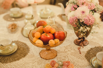 Tea table with food. Apples and marmelade