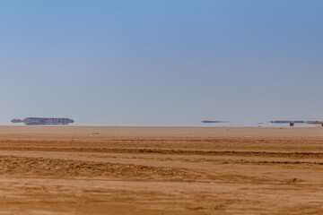 Fata Morgana (mirage) on the horizon of Sahara